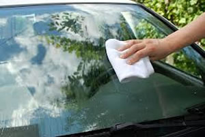 windshield being cleaned